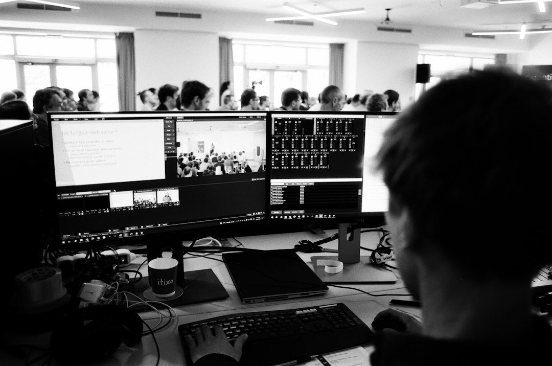 Editor working with analogue film editing equipment in a studio