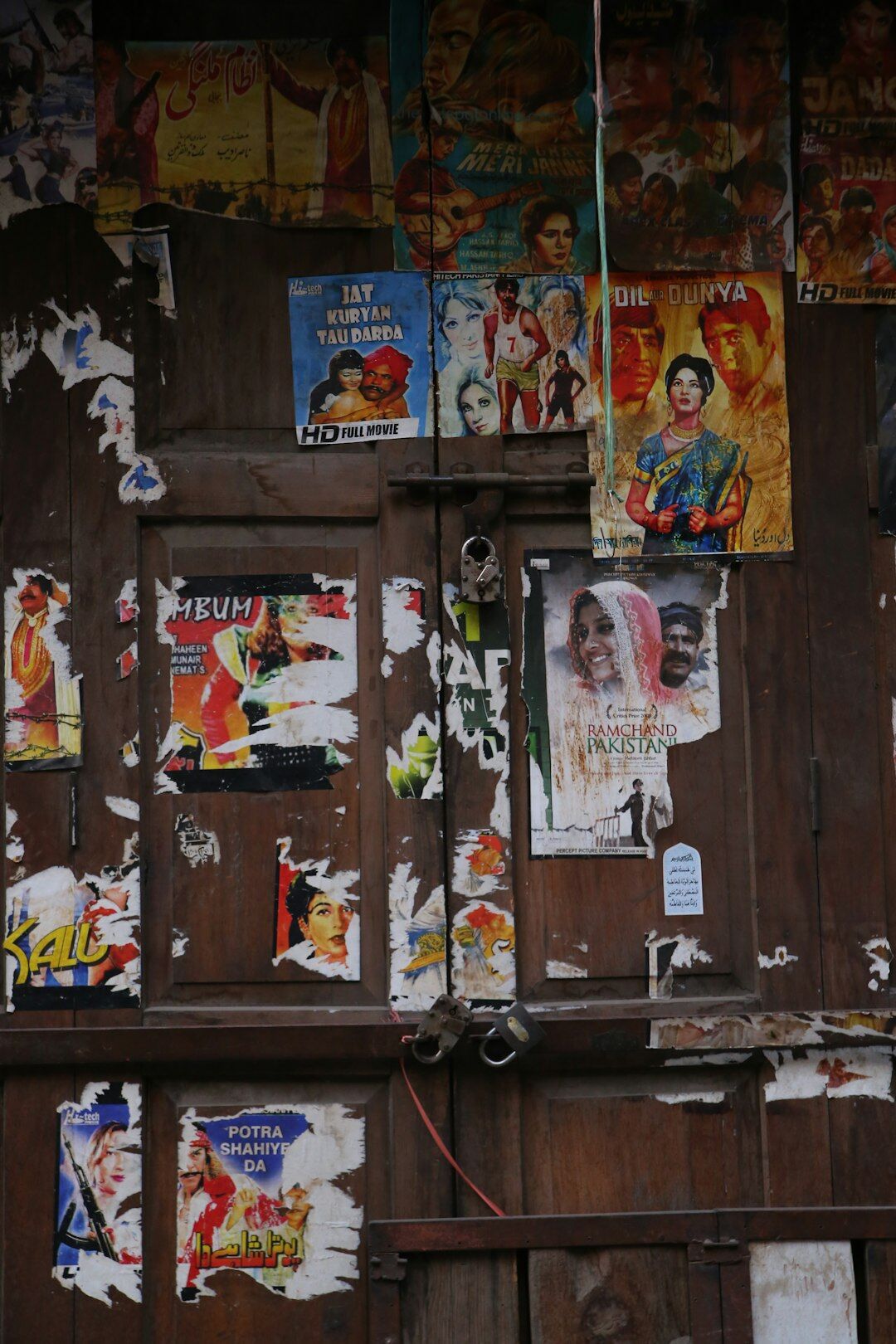 Archive room filled with vintage advertising posters and film reels